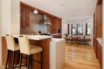 Breakfast bar seating and formal dining table 